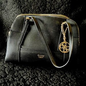 All black Guess purse.
